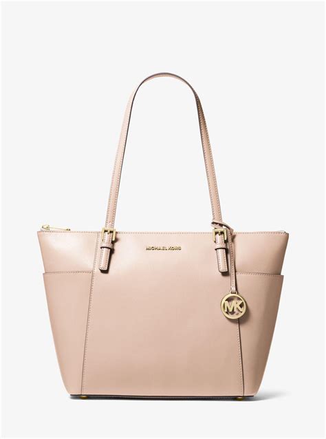 michael kors jet set pink zip top tote bag|Michael Kors airplane print bag.